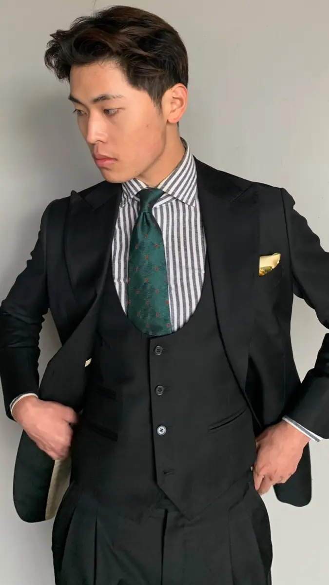 Sam Seo in a custom suit