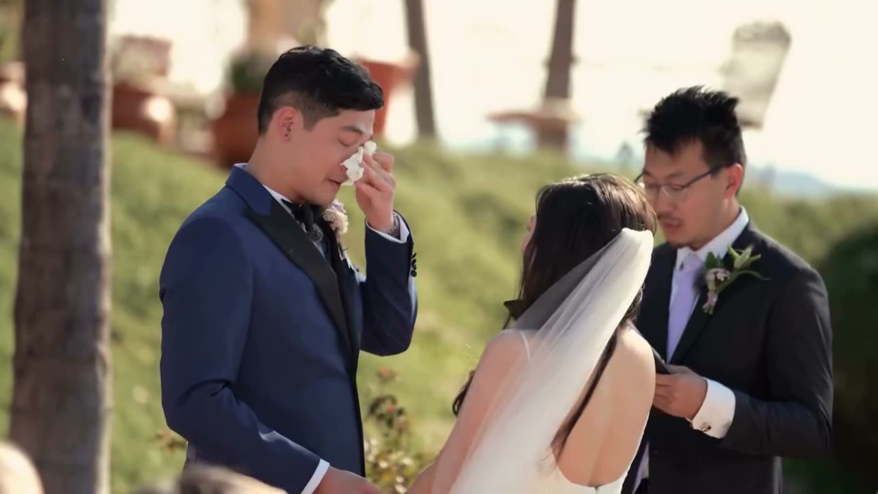 Kavalier groom exchanging vows at a villa wedding, suit ordered months ahead, March 2026